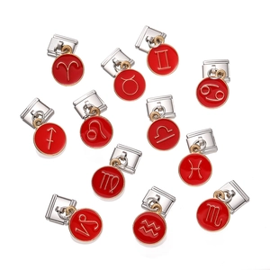 12-piece zodiac charm set with red enamel and gold symbols for DIY charm bracelets