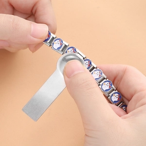 Italian charm bracelet assembly tool and modular stainless steel links with cartoon designs