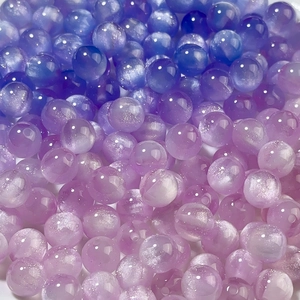 Detailed view of 8/12mm mermaid resin round beads with gradient colors for DIY jewelry crafts