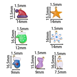 Detailed size chart for seven Christmas enamel charms including Santa hats and snowflakes