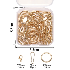 Détail du kit porte-clés DIY avec fermoirs mousquetons et anneaux en boîte transparente