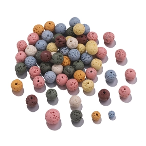 Macro detail of porous volcanic lava beads in Morandi colors for aromatherapy DIY