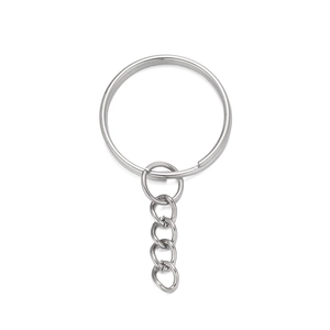 Close-up of polished silver metal key ring with attached short chain link for DIY crafts