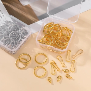 Kit de création bijoux avec fermoirs homard et anneaux or et argent dans des boîtes