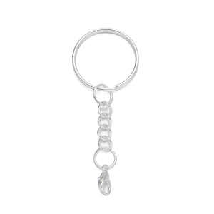 Close-up of silver metal key ring set with chain and lobster clasp connector