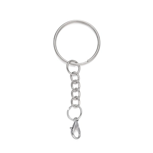 Close-up of polished silver metal keychain set with split ring, chain and lobster clasp