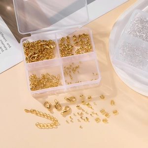 Kit de joyería DIY con cierres de langosta dorados y extensores en caja de 4 rejillas