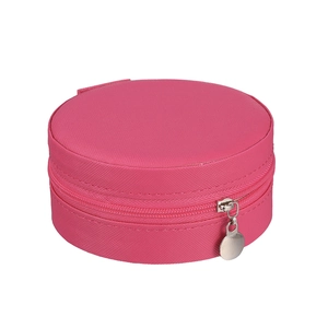 Detail view of round hot pink jewelry organizer with textured faux leather and zipper
