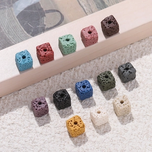 Macro detail of colorful square lava stone beads with porous texture for DIY jewelry