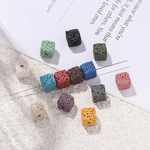 Macro view of square volcanic lava stone beads in various colors for DIY jewelry making