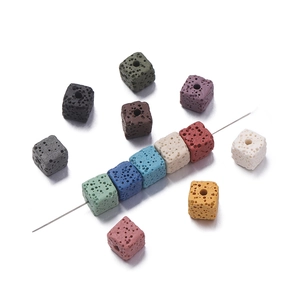 Macro shot of colorful square lava stone beads with natural porous texture for DIY jewelry