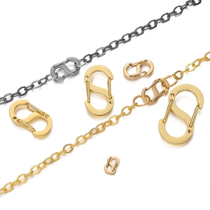 Detail of S-shaped spring buckles in gold and silver finish for DIY jewelry making