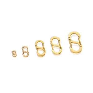 Detail of 5 gold stainless steel S-shaped lobster clasps in various sizes for DIY jewelry