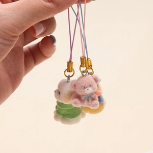 Cute flocked animal pendants in pink and yellow with golden metal alloy mobile phone straps