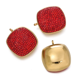 Detail of red micro-pave square pendants with polished gold-tone metal backings