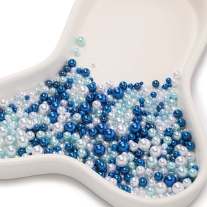 Mix of blue and white ABS faux pearls in various sizes for DIY craft jewelry making