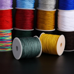 Detailed view of colorful 1.5mm nylon cord rolls for DIY jewelry and knotting