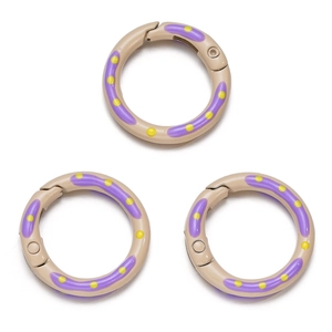 Drie gekleurde legering veerringen met paarse strepen en gele stippen voor DIY sieraden
