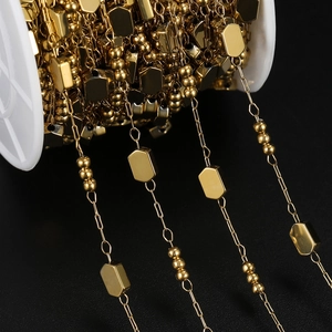 Macro shot of gold plated stainless steel chain rolls for DIY jewelry necklaces