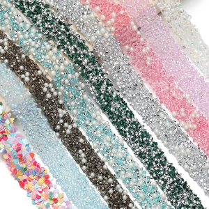 Detail of colorful self-adhesive rhinestone strips with pearls and sequins for DIY crafts