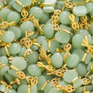 Bulk pile of green lucky bag charms with golden ruyi knots for DIY jewelry making