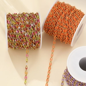 Macro view of colorful enamel stainless steel twisted oval chain for DIY jewelry craft