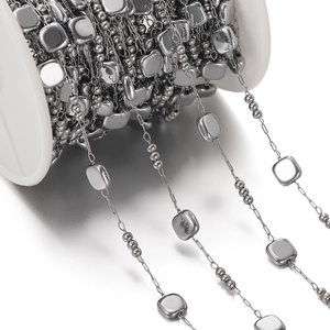 DIY stainless steel chain with square and round beads on a white plastic spool