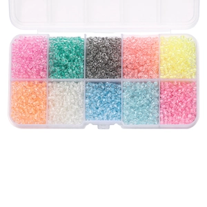 Top view of 10-compartment storage box filled with colorful 3mm glass seed beads for DIY crafts