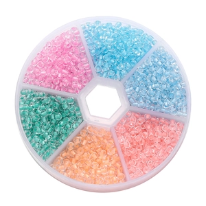 Close-up of 6-grid storage box with colorful 3mm glass seed beads for DIY jewelry making