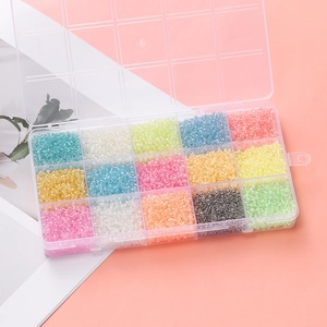 Detailed view of 15-compartment organizer box with various colorful 3mm glass seed beads