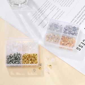 Juego de cierres para pendientes de silicona y metal en una caja de plástico de 4 ranuras