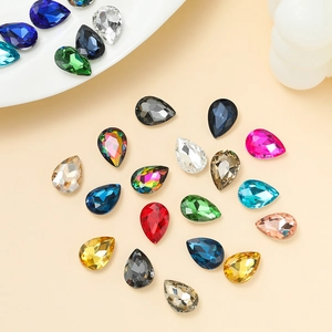Macro shot of colorful pear-cut glass rhinestones for DIY wedding dress accessories