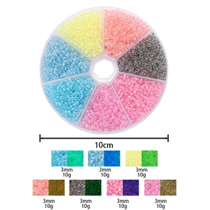 Detail of 3mm luminous seed beads in a 10cm circular storage box for DIY craft kits