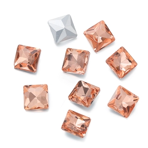 Macro shot of square champagne crystal glass rhinestones with silver pointed back
