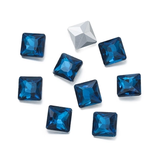 Detail of square navy blue crystal rhinestones with silver backing for DIY jewelry design