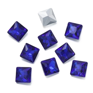 Macro shot of dark blue square cut crystal glass rhinestones for DIY crafts and jewelry