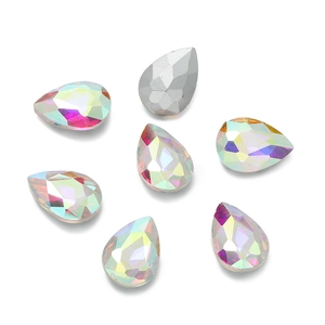 Detailed view of faceted teardrop glass rhinestones in iridescent AB and silver finish