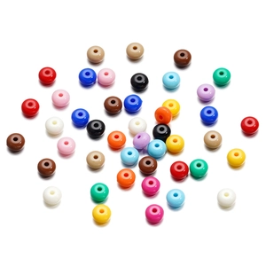 Macro shot of 8mm acrylic candy-colored donut beads for DIY bracelet jewelry making