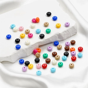 Macro detail of 8mm acrylic candy color flat round beads for DIY jewelry making