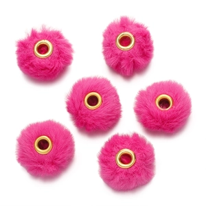 Close-up of fluffy rose pink faux rabbit fur beads with gold metal eyelets for DIY jewelry
