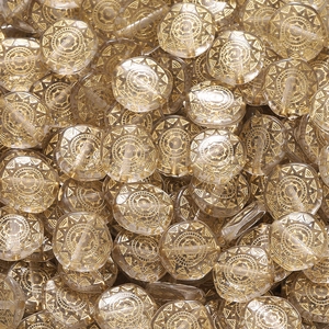 Makroaufnahme transparenter Acrylperlen mit goldenem Sonnenmuster für DIY-Schmuck