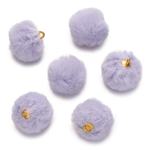Close-up of six soft purple faux fur pom pom charms with gold metal rings for DIY jewelry