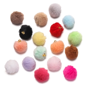 Colorful faux mink fur pom-poms with golden rings for DIY jewelry and crafts