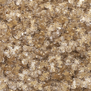Nahaufnahme von Acryl-Schleifenperlen mit Goldrand für DIY-Schmuckherstellung