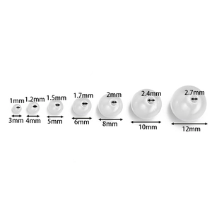 Various sizes of white ABS faux pearls from 3mm to 12mm with precise hole measurements