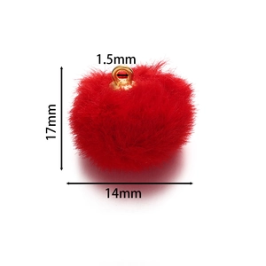 Macro shot of red faux mink fur pendant with 17mm gold ring for DIY jewelry making