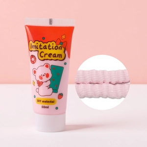 Vista detallada de pegamento crema rosa de 50ml con textura ondulada para manualidades