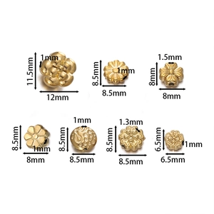 Detailed view of various golden stainless steel flower beads with specific size dimensions