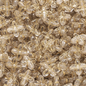 Makroaufnahme von Acryl-Vierblatt-Blütenperlen mit Goldrand für DIY-Schmuckherstellung