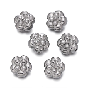Detail of silver stainless steel five-petal flower beads with side holes for DIY jewelry